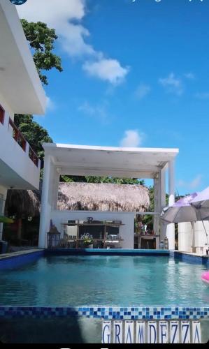 a swimming pool at a villa with a swimming poolvisorvisorvisor at Villa Noblezza in Las Lagunas