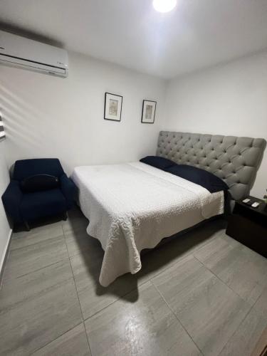 Postel nebo postele na pokoji v ubytování Magnífico Apto. Cerca de todo