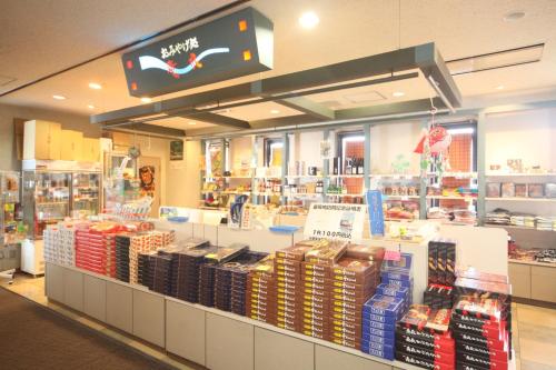 a store filled with lots of products on display at Hotel Tappi in Satogahama