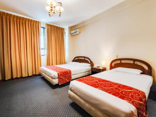 Letto o letti in una camera di Lido Hotel