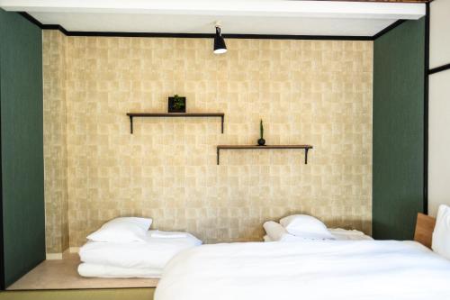 Una cama o camas en una habitación de Niseko Powder Chalet