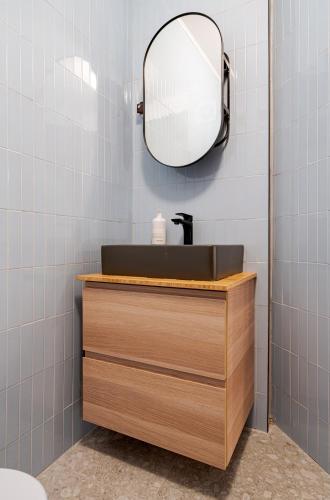 a bathroom with a sink and a mirror at Romana Boutique in Bucharest