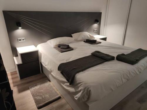 Кровать или кровати в номере Santo António Guest Apartment