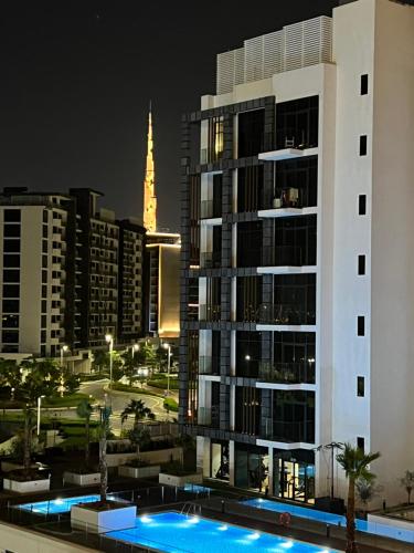 a view of a city skyline at night at Modern Studio Center of Dubai in Dubai