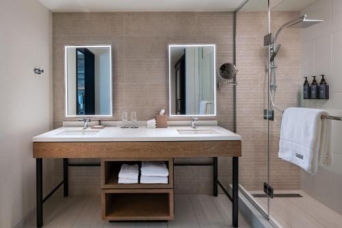 a bathroom with a sink and a shower at The Westin Dallas Southlake in Southlake