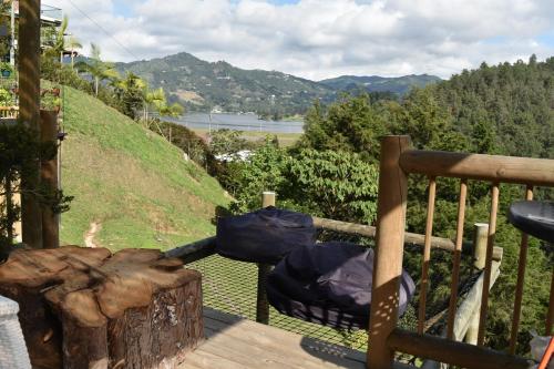 a balcony with a view of a hill at EL PAISAJE MAS SOÑADO in El Retiro