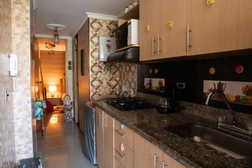 Кухня или мини-кухня в Elegante apartamento: Sabaneta Central
