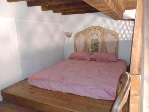 Voodi või voodid majutusasutuse Anticoloftsangallo toas