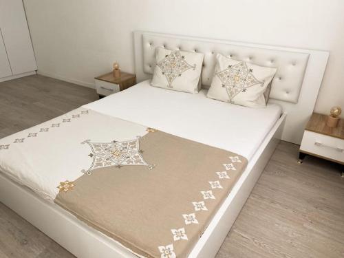 Кровать или кровати в номере City Center Apartment