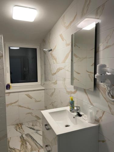 Koupelna v ubytování Apartman