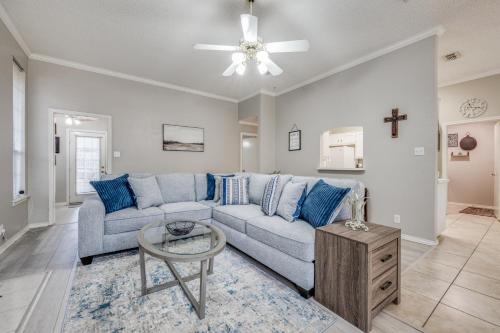 a living room with a couch and a table at Spacious Brick House 3BR 2BA A+ in Denton