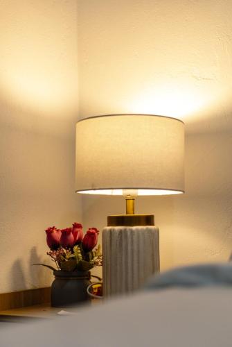 Katil atau katil-katil dalam bilik di Whitehaus BnB