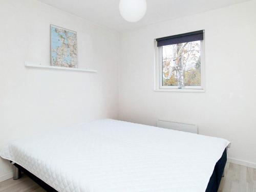 Postel nebo postele na pokoji v ubytování Holiday home Jægerspris XIX