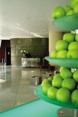 a lobby with a person standing in the background at Park Plaza Nottingham in Nottingham