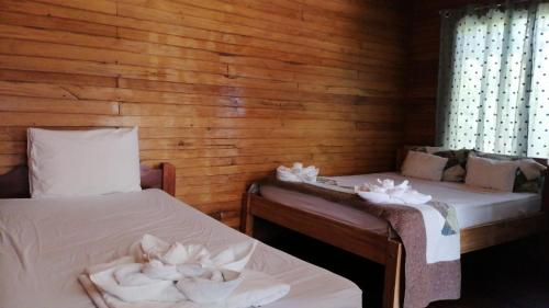 Кровать или кровати в номере Terrazas del Golfo