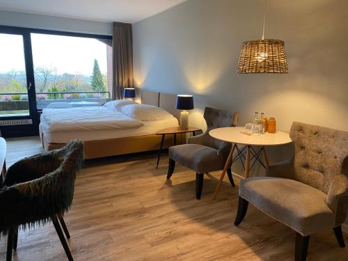 Postel nebo postele na pokoji v ubytování Das Hotel Ostseeblick