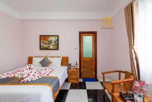 Uma cama ou camas num quarto em Luxy Park Hotel & Residences - Phu Quoc City Centre