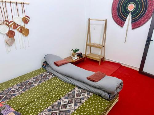 Postel nebo postele na pokoji v ubytování Pura Homestay