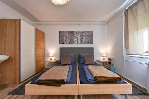 Postel nebo postele na pokoji v ubytování Apartman Jura, dvije spavaće sobe