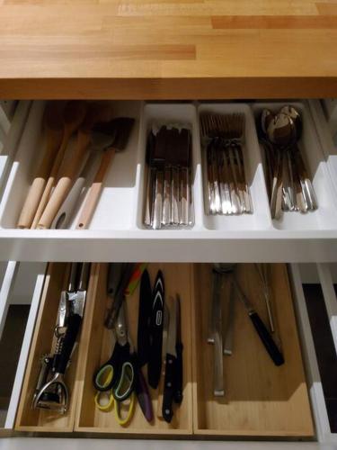 a drawer filled with lots of utensils at Sea la vie in Ostend