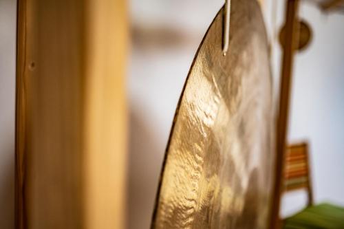 a close up of the back of a wooden chair at Der Winzerhof in Achau