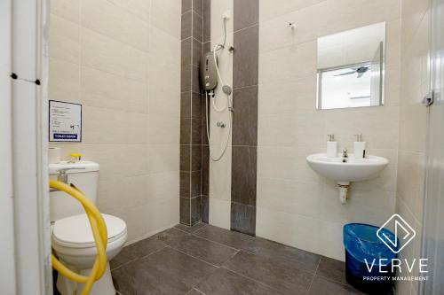 a bathroom with a toilet and a sink at Ipoh Luxury Suites by Verve (18 Pax) EECH16 in Ipoh