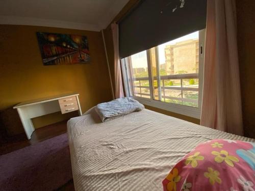 Ένα ή περισσότερα κρεβάτια σε δωμάτιο στο Elite stay at Madinaty