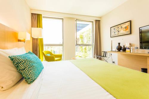 Postel nebo postele na pokoji v ubytování Courtyard by Marriott Montpellier