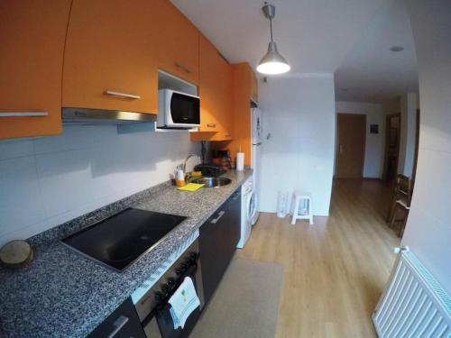 a kitchen with a sink and a counter top at apartamento en Colunga, en plena naturaleza in Colunga
