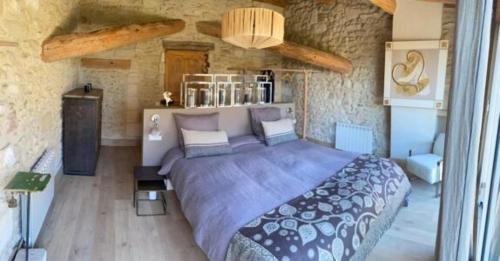 Postel nebo postele na pokoji v ubytování Manoir des Sources