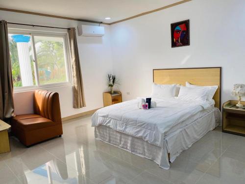 מיטה או מיטות בחדר ב-GRAND HOTEL CLARK