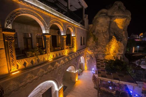 an aerial view of a building at night at Roma Cave Suite in Goreme