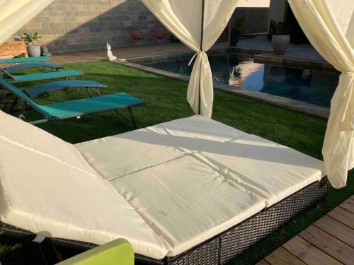 Photo de la galerie de l'établissement Villa moderne avec Piscine, à Murviel-lès-Montpellier