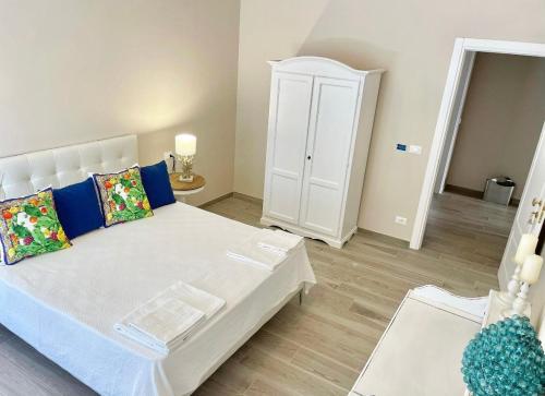 Postel nebo postele na pokoji v ubytování Domus Federiciana