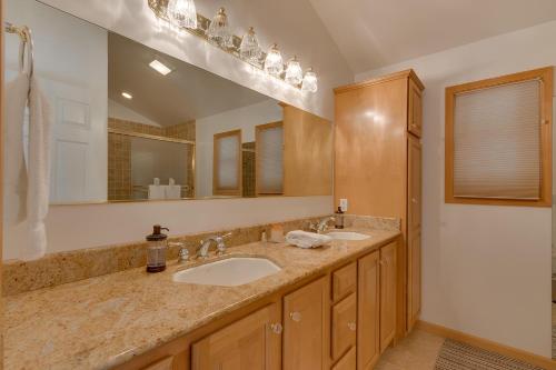 a bathroom with two sinks and a large mirror at Tahoma Charm on West Shore - Beautiful Open Concept 3 BR w Private Hot Tub in Tahoma
