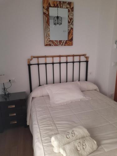 Postel nebo postele na pokoji v ubytování Casa Los García