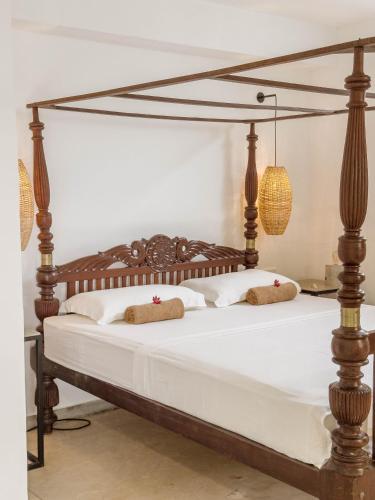 Cama o camas de una habitación en Alice in Paradise