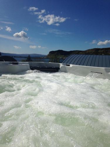 a dam on a river with water in it at Stones Luxury B&B with hot tub and self-contained rooms in Uig