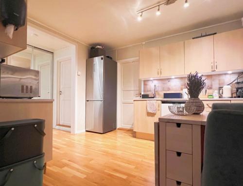 Kjøkken eller kjøkkenkrok på Koselig leilighet med fantastisk utsikt