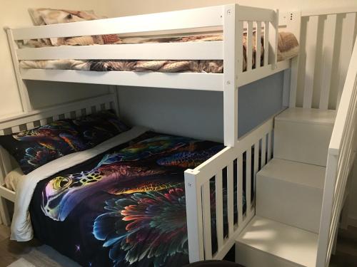 a bunk bed in a childs room at Lakefront retreat house in Sumner