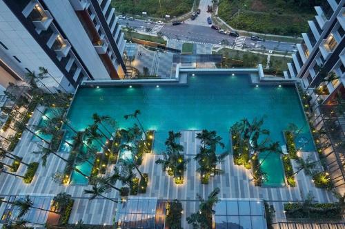 an overhead view of a swimming pool in a building at Grand Medini, Iskandar Puteri, Johor in Nusajaya