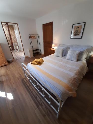 Katil atau katil-katil dalam bilik di La remise à calèches / The carriage house