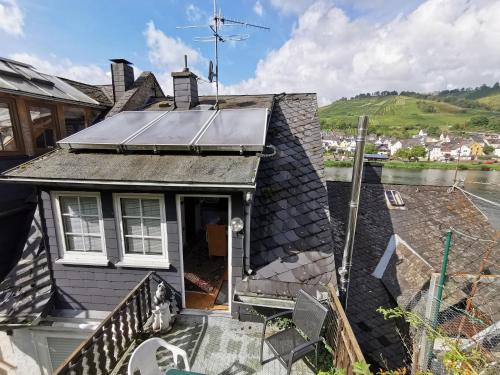 an image of a house with a solar roof at Mosel View in Zell an der Mosel