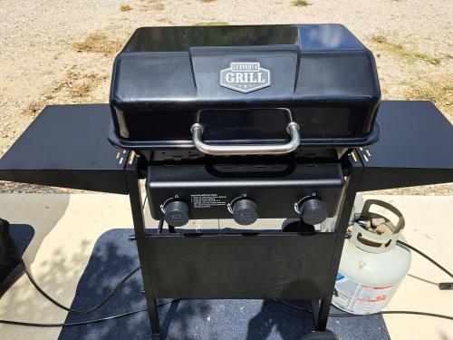a grill sitting on top of a table at The Container Retreat @ 290 Wine Trail #9 Get away today! in Hye