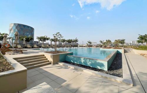 Bazén v ubytování Cozy Apartment in Dubai Hills nebo v jeho okolí