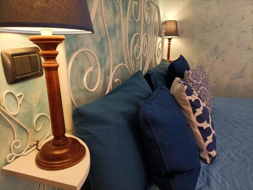 Letto o letti in una camera di Dimora San Martino