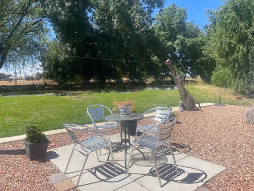 a table and chairs sitting on a patio at Kerang Holiday park in Kerang
