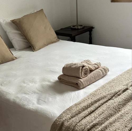 Säng eller sängar i ett rum på Nina's Stay Hostel