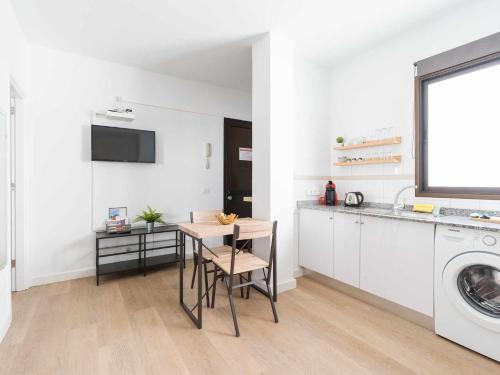 Η κουζίνα ή μικρή κουζίνα στο Mahostly Apartamento Comillas SE