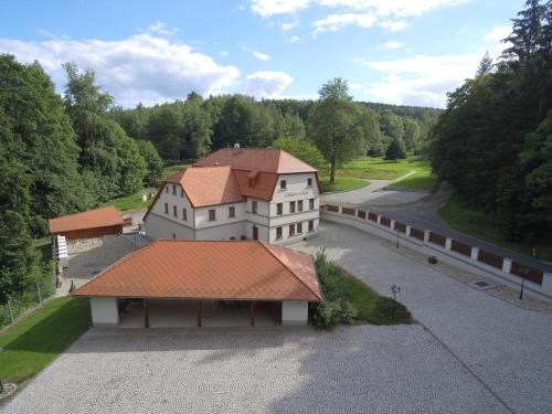 an overhead view of a building with a roof at Penzion Čítkův Mlýn in Šluknov